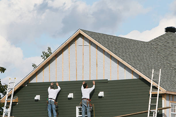 Professional Siding technician working in Claridge, PA
